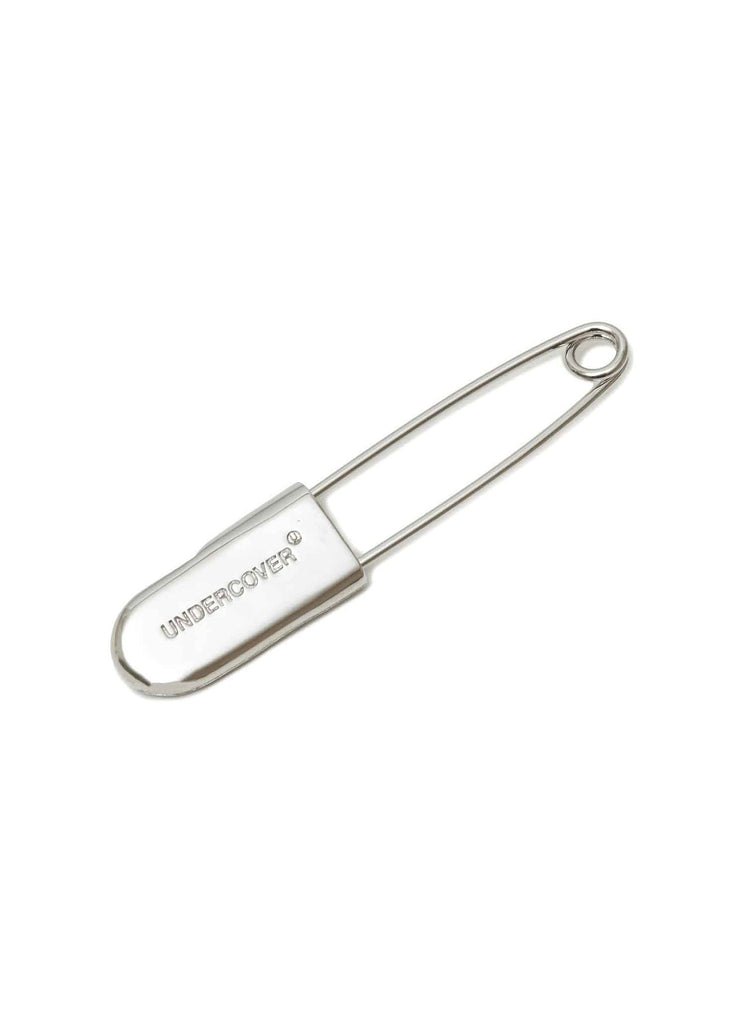 UNDERCOVER "BRASS SAFETY PIN" SILVER