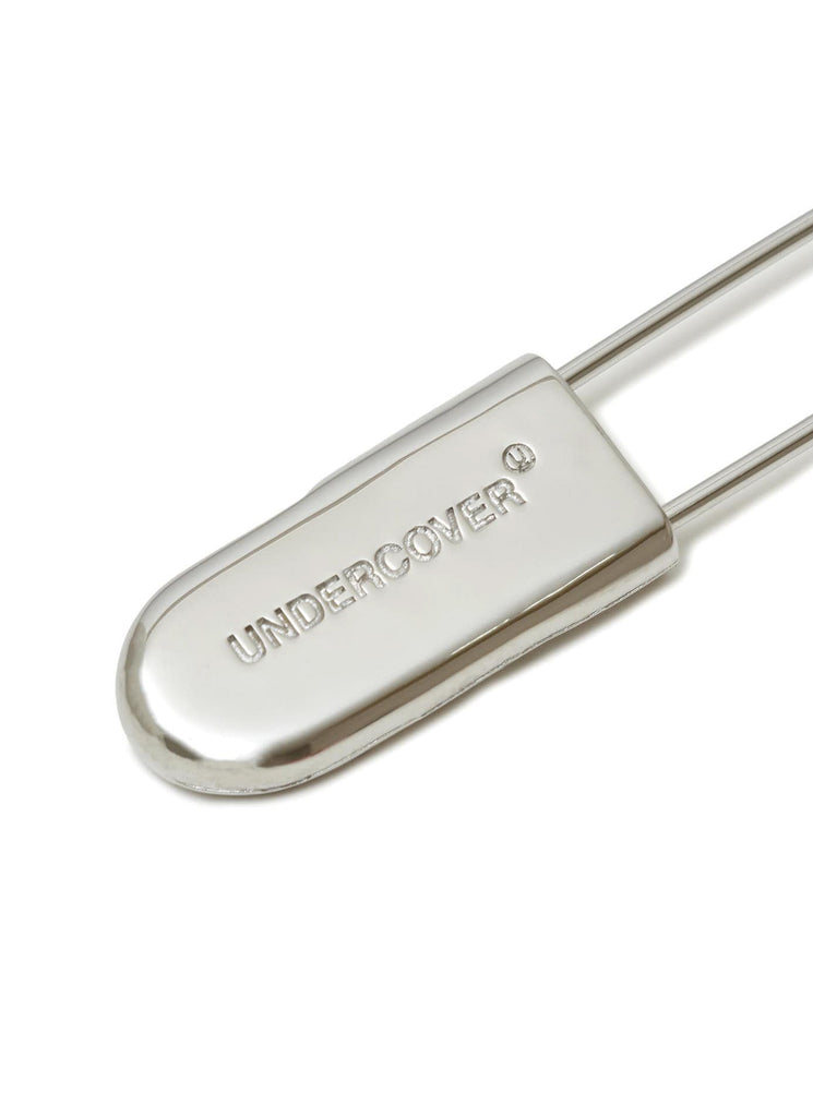 UNDERCOVER "BRASS SAFETY PIN" SILVER